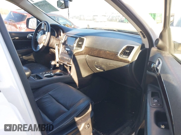 2012 Jeep Grand Cherokee Laredo with VIN 1C4RJFAG5CC310893, listed as a IAAI auction lot 41695279 with 136,821 mi miles. Bid and sale history available at carsss.com. Image 5.