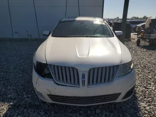 2012 Lincoln MKS with VIN 1LNHL9DR1CG805164, listed as a Copart auction lot 48375595 with 104,246 mi miles and Salvage Title. Bid and sale history available at carsss.com. Image 5.