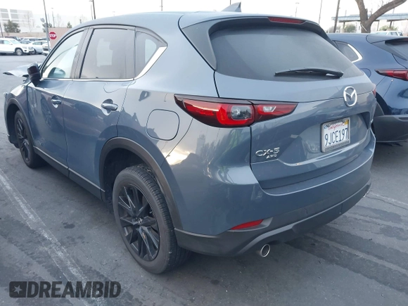 2024 Mazda CX-5 S Carbon Edition z VIN JM3KFBCM6R0359097, wystawiony jako IAAI lot #41743569 z przebiegiem 13 114 mil mil oraz . Historia ofert i sprzedaży dostępna na DreamBid. Obrazek 3.