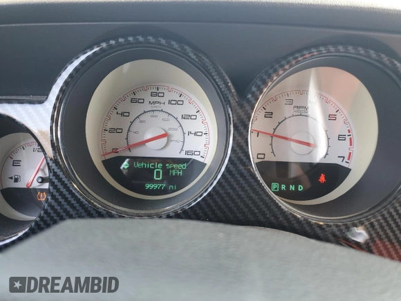 2014 Dodge Challenger R/T z VIN 2C3CDYBT6EH112199, wystawiony jako Copart lot #58023535 z przebiegiem 99 977 mil mil oraz Szkody całkowita. Historia ofert i sprzedaży dostępna na DreamBid. Obrazek 9.