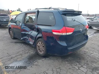 2011 Toyota Sienna XLE AAS with VIN 5TDYK3DCXBS113103, listed as a IAAI auction lot 41505972 with 170,919 mi miles and . Bid and sale history available at DreamBid. Image 3.