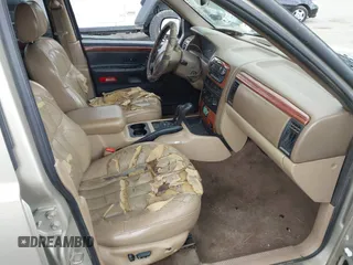 1999 Jeep Grand Cherokee Limited with VIN 1J4GW68SXXC664055, listed as a IAAI auction lot 42339125 with 219,792 mi miles and . Bid and sale history available at DreamBid. Image 5.