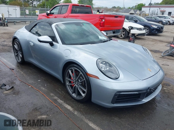 2020 Porsche 911 Carrera S with VIN WP0CB2A97LS262106, listed as a IAAI auction lot 42011151 with 63,444 mi miles. Bid and sale history available at carsss.com. Image 1.