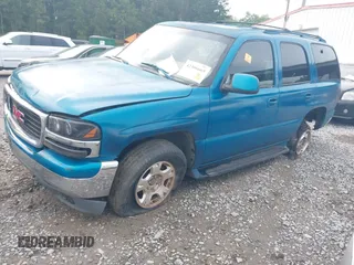 2001 GMC Yukon SLT z VIN 1GKEK13TX1J191325, wystawiony jako IAAI lot #42306665 z przebiegiem Nie podano mil oraz . Historia ofert i sprzedaży dostępna na DreamBid. Obrazek 2.