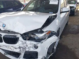 2018 BMW X1 xDrive28i with VIN WBXHT3C36J5K26486, listed as a IAAI auction lot 41839817 with 65,835 mi miles. Bid and sale history available at carsss.com. Image 6.