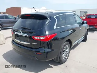 2015 Infiniti QX60 with VIN 5N1AL0MM7FC509756, listed as a IAAI auction lot 42024707 with 167,511 mi miles and . Bid and sale history available at DreamBid. Image 4.