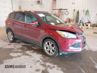 2014 Ford Escape Titanium with VIN 1FMCU0JX6EUC58726, listed as a IAAI auction lot 41656779 with 162,888 mi miles. Bid and sale history available at carsss.com. Image 1.