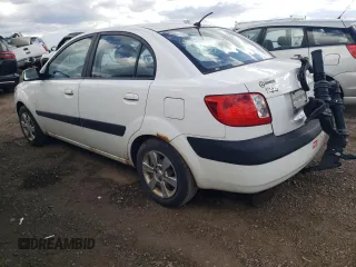 2007 Kia Rio LX with VIN KNADE123976187291, listed as a Copart auction lot 74561344 with 166,583 mi miles and Salvage Title. Bid and sale history available at carsss.com. Image 2.