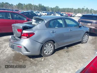 2023 Kia Rio LX z VIN 3KPA24AD5PE603017, wystawiony jako IAAI lot #41590704 z przebiegiem 44 553 mil mil oraz . Historia ofert i sprzedaży dostępna na DreamBid. Obrazek 13.