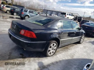 2004 Volkswagen Phaeton V8 z VIN WVWAF63D048011494, wystawiony jako Copart lot #43921145 z przebiegiem 129 758 mil mil oraz Tytuł czysty. Historia ofert i sprzedaży dostępna na DreamBid. Obrazek 3.