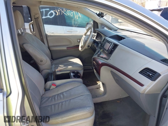 2013 Toyota Sienna XLE AAS with VIN 5TDYK3DC9DS304059, listed as a IAAI auction lot 41883196 with 170,842 mi miles and . Bid and sale history available at DreamBid. Image 5.