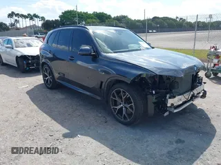 2022 BMW X5 xDrive45e z VIN 5UXTA6C0XN9M95480, wystawiony jako IAAI lot #41700847 z przebiegiem 23 169 mil mil oraz . Historia ofert i sprzedaży dostępna na DreamBid. Obrazek 1.