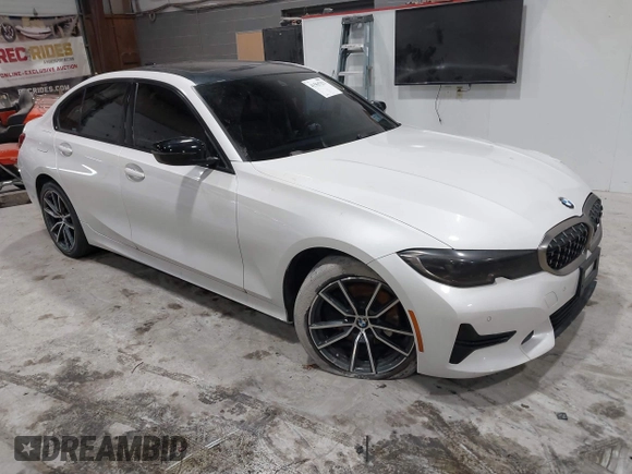 2019 BMW 3 Series 330i xDrive with VIN WBA5R7C55KAJ83482, listed as a IAAI auction lot 41565321 with 126,536 mi miles. Bid and sale history available at carsss.com. Image 1.