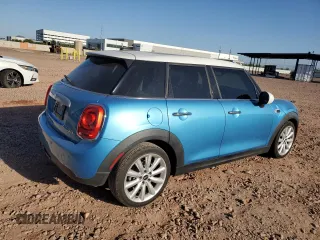 2015 MINI Hardtop 4 Door with VIN WMWXS5C54FT827341, listed as a Copart auction lot 63872395 with 83,023 mi miles and Salvage title. Bid and sale history available at DreamBid. Image 3.