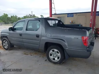 2009 Honda Ridgeline RT with VIN 2HJYK16279H501015, listed as a IAAI auction lot 41996301 with 124,716 mi miles. Bid and sale history available at carsss.com. Image 14.