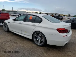 2016 BMW M5 z VIN WBSFV9C52GG343300, wystawiony jako Copart lot #49419563 z przebiegiem 39 217 mil mil oraz . Historia ofert i sprzedaży dostępna na DreamBid. Obrazek 2.