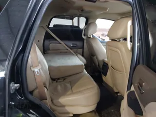 2014 Chevrolet Tahoe LT z VIN 1GNSCBE01ER190342, wystawiony jako IAAI lot #41578109 z przebiegiem 204 781 mil mil oraz . Historia ofert i sprzedaży dostępna na DreamBid. Obrazek 8.
