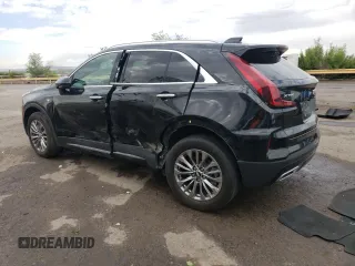 2024 Cadillac XT4 FWD Premium Luxury z VIN 1GYFZCR43RF221412, wystawiony jako Copart lot #55507885 z przebiegiem 23 702 mil mil oraz Tytuł czysty. Historia ofert i sprzedaży dostępna na DreamBid. Obrazek 2.