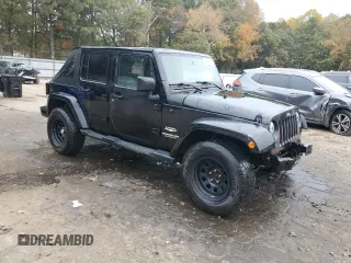 2008 Jeep Wrangler Unlimited Sahara with VIN 1J4GA59148L574934, listed as a Copart auction lot 74590164 with 134,674 mi miles and Salvage title. Bid and sale history available at DreamBid. Image 4.