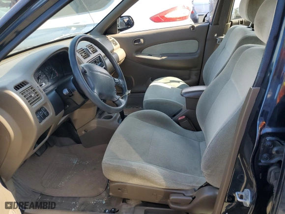 1997 Mazda Protege DX with VIN JM1BC1412V0157268, listed as a Copart auction lot 61380564 with 85,356 mi miles and Salvage Title. Bid and sale history available at carsss.com. Image 7.