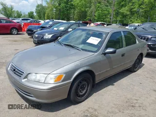 2001 Toyota Camry CE with VIN 4T1BG22KX1U072957, listed as a IAAI auction lot 42167686 with 200,126 mi miles. Bid and sale history available at carsss.com. Image 2.