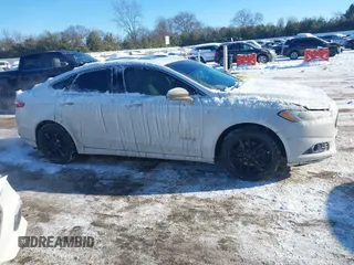 2013 Ford Fusion SE Hybrid with VIN 3FA6P0LU8DR272165, listed as a IAAI auction lot 41333539 with 196,843 mi miles. Bid and sale history available at carsss.com. Image 12.