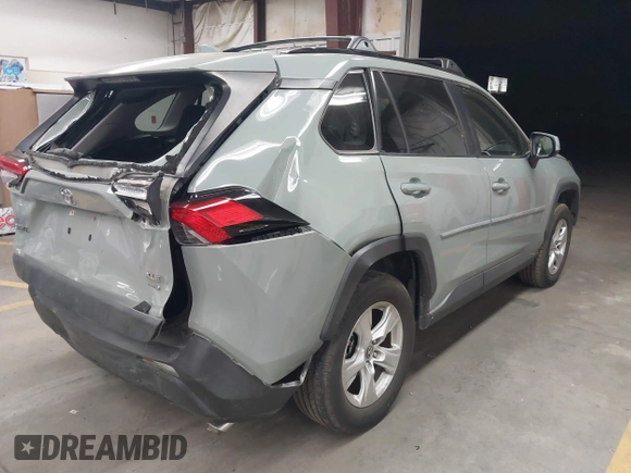 2019 Toyota RAV4 XLE with VIN JTMP1RFV2KD028137, listed as a IAAI auction lot 41931454 with 88,998 mi miles and . Bid and sale history available at DreamBid. Image 4.