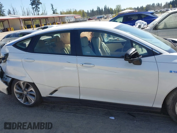 2019 Honda Clarity with VIN JHMZC5F1XKC007033, listed as a IAAI auction lot 42064611 with 28,458 mi miles. Bid and sale history available at carsss.com. Image 13.