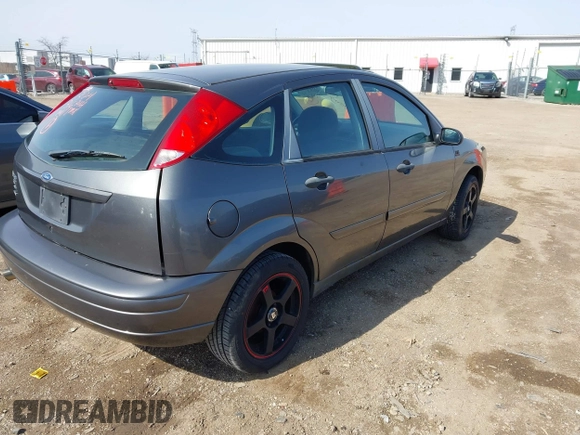 2007 Ford Focus S z VIN 1FAHP37N17W316344, wystawiony jako IAAI lot #41882805 z przebiegiem 262 422 mil mil oraz . Historia ofert i sprzedaży dostępna na DreamBid. Obrazek 4.