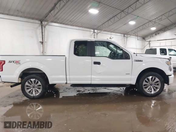 2017 Ford F-150 XL with VIN 1FTEX1EP4HFC84612, listed as a IAAI auction lot 41553736 with 145,235 mi miles. Bid and sale history available at carsss.com. Image 13.