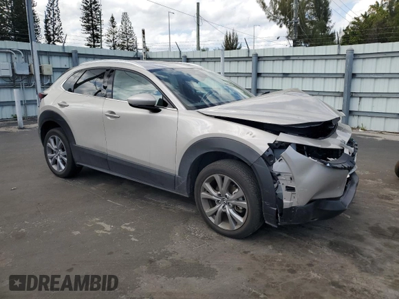 2024 Mazda CX-30 S Premium with VIN 3MVDMBDM6RM653469, listed as a Copart auction lot 47192475 with 9,854 mi miles and Salvage title. Bid and sale history available at DreamBid. Image 4.