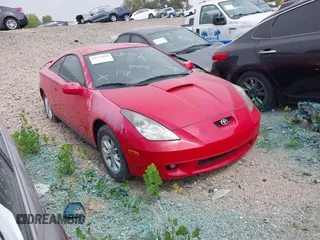 2000 Toyota Celica GT with VIN JTDDR32T8Y0018516, listed as a IAAI auction lot 39373088 with 230,382 mi miles. Bid and sale history available at carsss.com. Image 1.