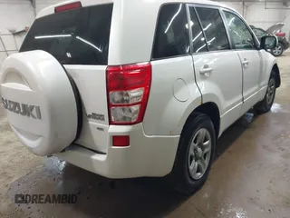 2012 Suzuki Grand Vitara Premium z VIN JS3TD0D26C4100406, wystawiony jako IAAI lot #42039965 z przebiegiem 106 671 mil mil oraz . Historia ofert i sprzedaży dostępna na DreamBid. Obrazek 4.