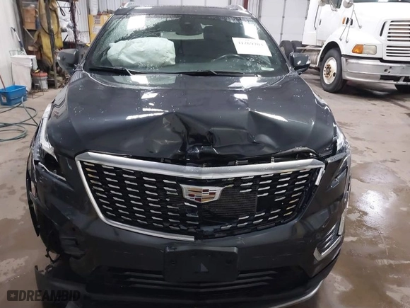 2021 Cadillac XT5 AWD Premium Luxury with VIN 1GYKNDRS1MZ148806, listed as a IAAI auction lot 41269703 with 31,739 mi miles. Bid and sale history available at carsss.com. Image 12.