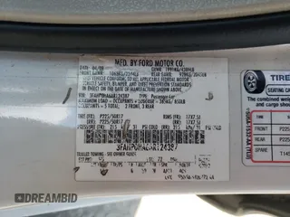 2010 Ford Fusion SE with VIN 3FAHP0HA6AR124387, listed as a Copart auction lot 62008405 with 196,524 mi miles and Salvage title. Bid and sale history available at DreamBid. Image 12.