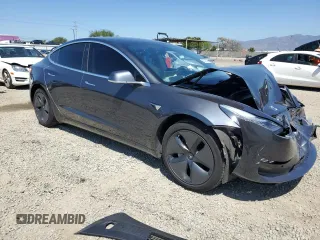 2019 Tesla Model 3 Mid Range with VIN 5YJ3E1EA2KF416304, listed as a Copart auction lot 52792845 with 140,552 mi miles and Salvage Title. Bid and sale history available at DreamBid. Image 4.
