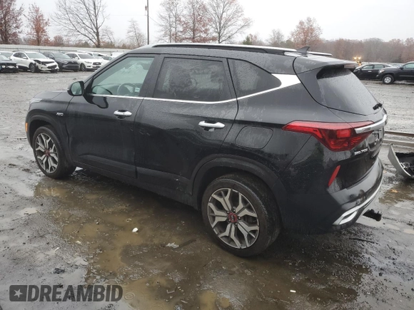 2021 Kia Seltos SX with VIN KNDETCA29M7217543, listed as a Copart auction lot 82009644 with 56,270 mi miles and Salvage Title. Bid and sale history available at carsss.com. Image 2.