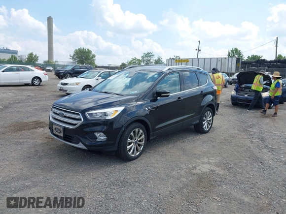 2018 Ford Escape Titanium z VIN 1FMCU9J9XJUB66275, wystawiony jako IAAI lot #42757952 z przebiegiem 97 629 mil mil oraz . Historia ofert i sprzedaży dostępna na DreamBid. Obrazek 17.
