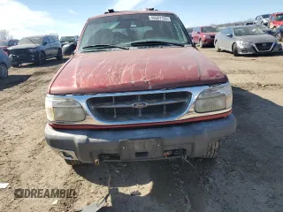1999 Ford Explorer XLT z VIN 1FMZU34EXXZB15936, wystawiony jako Copart lot #46587165 z przebiegiem 158 908 mil mil oraz Szkoda całkowita • Salvage title. Historia ofert i sprzedaży dostępna na DreamBid. Obrazek 5.