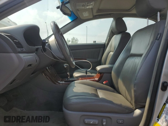 2006 Toyota Camry LE z VIN 4T1BF30K66U115872, wystawiony jako Copart lot #60526695 z przebiegiem 164 561 mil mil oraz Szkoda całkowita • Salvage title. Historia ofert i sprzedaży dostępna na DreamBid. Obrazek 7.