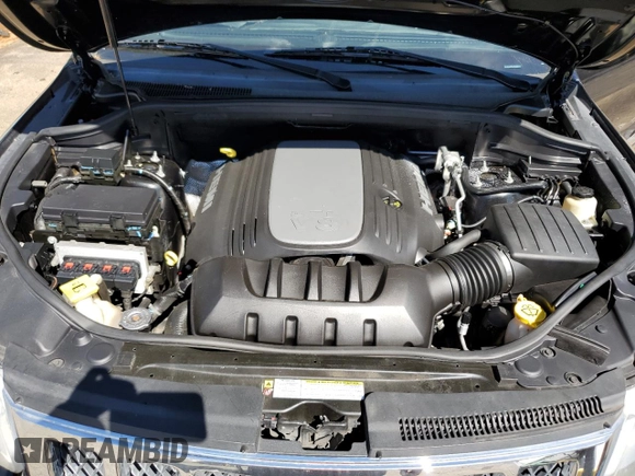 2012 Jeep Grand Cherokee Overland with VIN 1C4RJECTXCC227769, listed as a Copart auction lot 68760174 with 144,537 mi miles and Salvage Title. Bid and sale history available at carsss.com. Image 12.