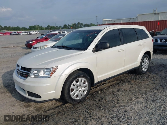 2015 Dodge Journey SE z VIN 3C4PDCAB9FT592689, wystawiony jako IAAI lot #42108322 z przebiegiem 158 140 mil mil oraz . Historia ofert i sprzedaży dostępna na DreamBid. Obrazek 2.
