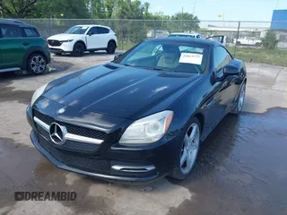 2013 Mercedes-Benz SLK-Class SLK 250 with VIN WDDPK4HA5DF059891, listed as a IAAI auction lot 42015777 with 79,255 mi miles. Bid and sale history available at carsss.com. Image 2.