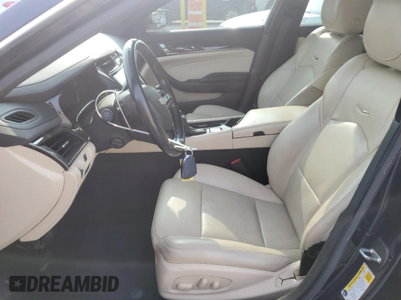 2017 Cadillac CTS Luxury AWD with VIN 1G6AX5SX7H0141380, listed as a Copart auction lot 58999135 with 91,003 mi miles and Salvage title. Bid and sale history available at DreamBid. Image 7.