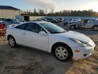 2004 Toyota Celica GT with VIN JTDDR32T640167629, listed as a Copart auction lot 78280574 with 143,551 mi miles and Salvage Title. Bid and sale history available at DreamBid. Image 4.