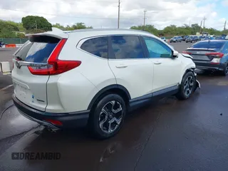 2018 Honda CR-V Touring with VIN 2HKRW1H96JH506435, listed as a IAAI auction lot 41228873 with 11,585 mi miles and . Bid and sale history available at DreamBid. Image 4.