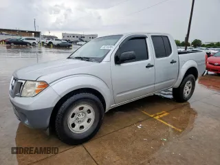 2014 Nissan Frontier SL with VIN 1N6AD0EV4EN712029, listed as a Copart auction lot 60215295 with 199,584 mi miles and Salvage title. Bid and sale history available at DreamBid. Image 1.