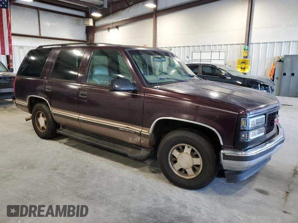 1997 GMC Yukon with VIN 1GKEC13R2VJ734299, listed as a Copart auction lot 74988224 with 225,335 mi miles and Salvage Title. Bid and sale history available at carsss.com. Image 4.