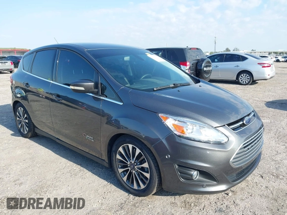 2017 Ford C-Max Energi Titanium with VIN 1FADP5FU9HL117693, listed as a IAAI auction lot 42059763 with 86,827 mi miles. Bid and sale history available at carsss.com. Image 1.