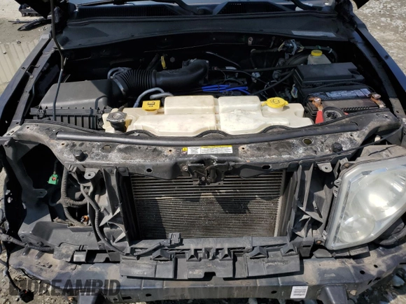 2011 Jeep Liberty Limited 70th Anniversary with VIN 1J4PN5GK0BW569476, listed as a Copart auction lot 53065455 with 138,512 mi miles and Salvage Title. Bid and sale history available at DreamBid. Image 11.